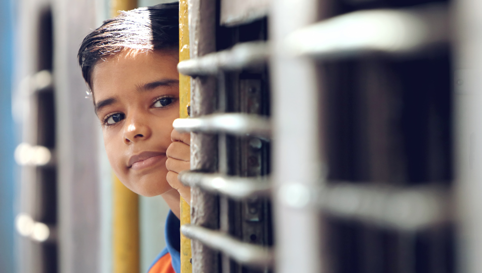 Young boy on train in India