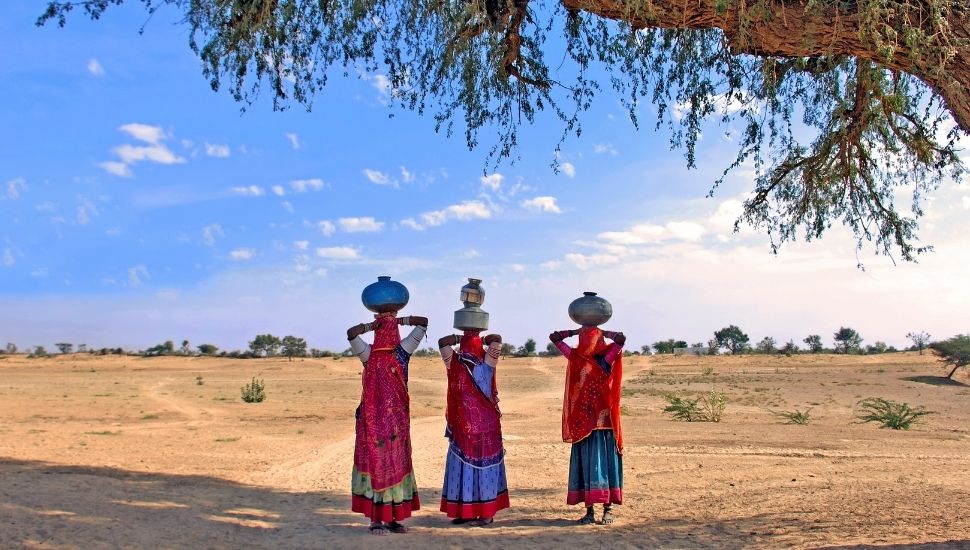 Women carrying water in Thar Desert