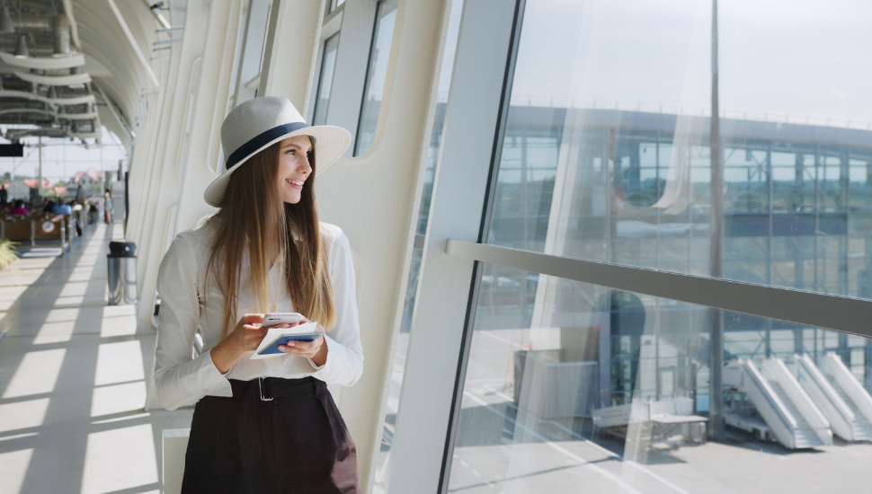 Happy woman at airport