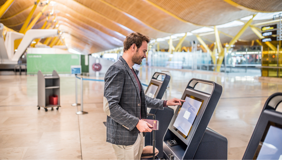 Lone man at airport check in