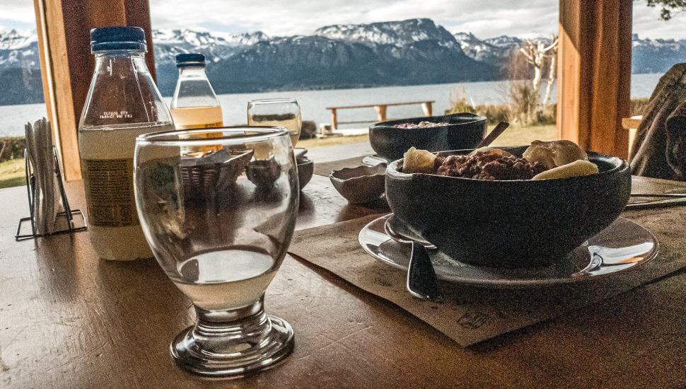 Restaurant with view of mountains and lake in Patagonia