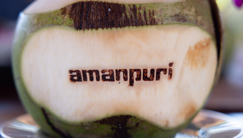 Amanpuri Resorts Name Stamp on Coconut Surface in Phuket Thailand