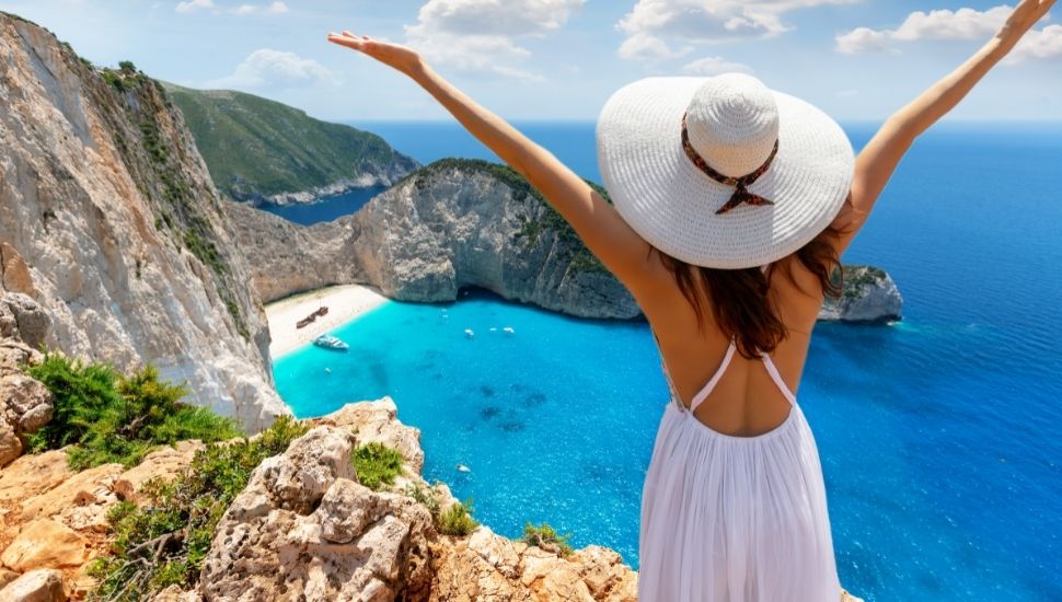 Woman happy to be holidaying in Zante Greece