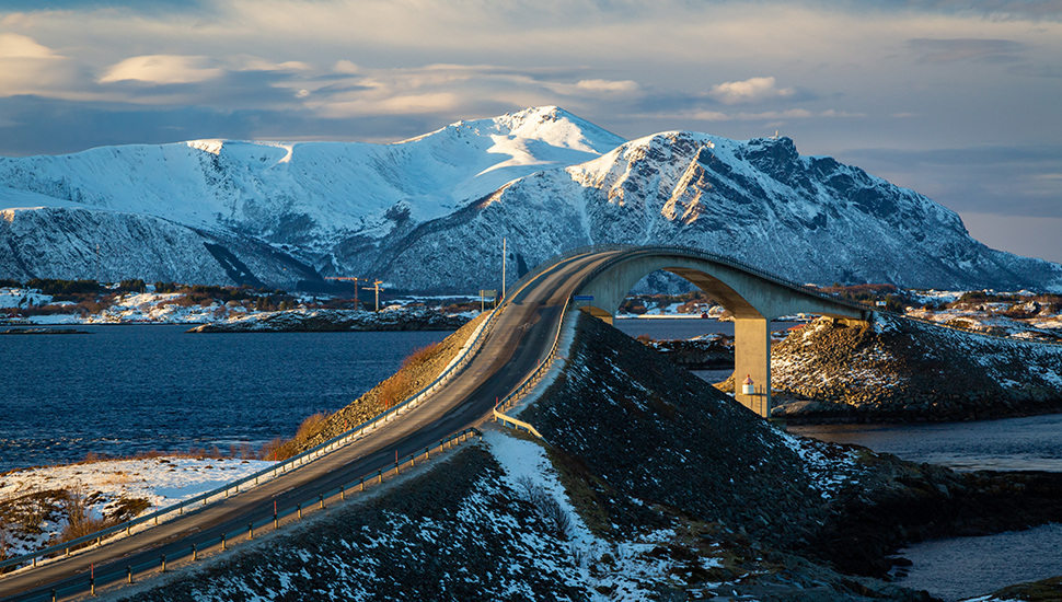 Norwegian road and bridge on winter sunny day 