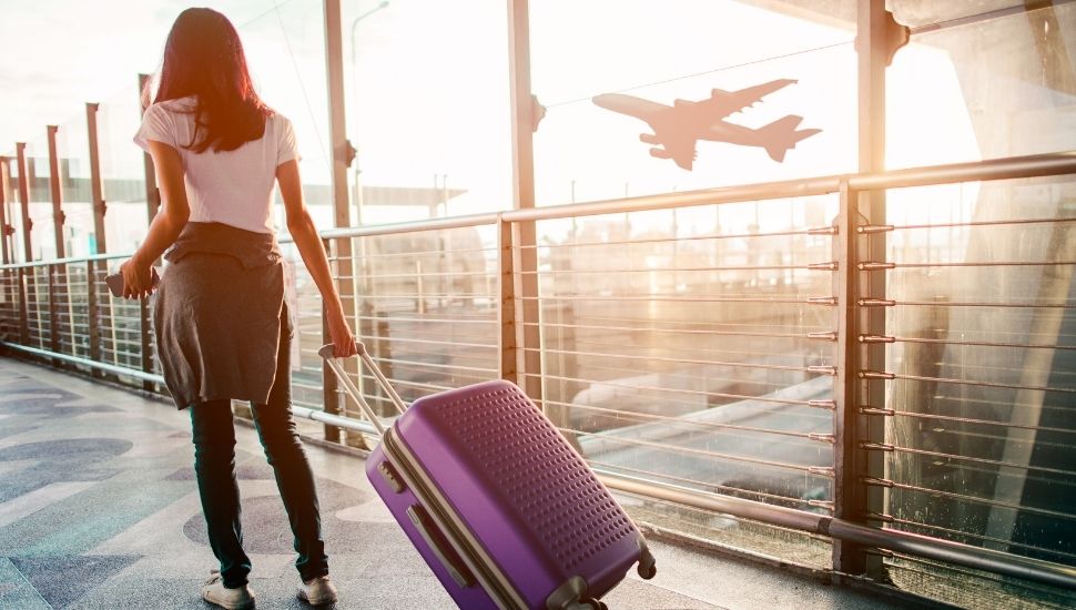 Passenger at airport for holiday vacation