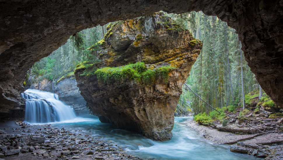 Johnston Canyon cave in Spring season with waterfalls, Canada