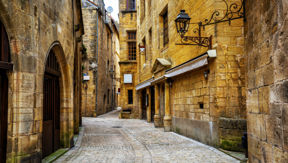 Narrow street in the Old Town of Sarlat, Perigord, France