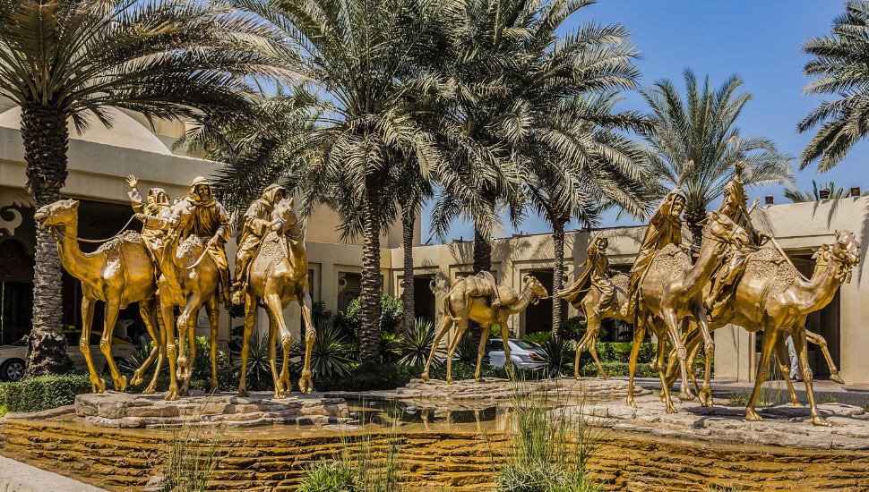 Gold camel sculptures at the entrance of the One & Only Royal Mirage hotel in Dubai