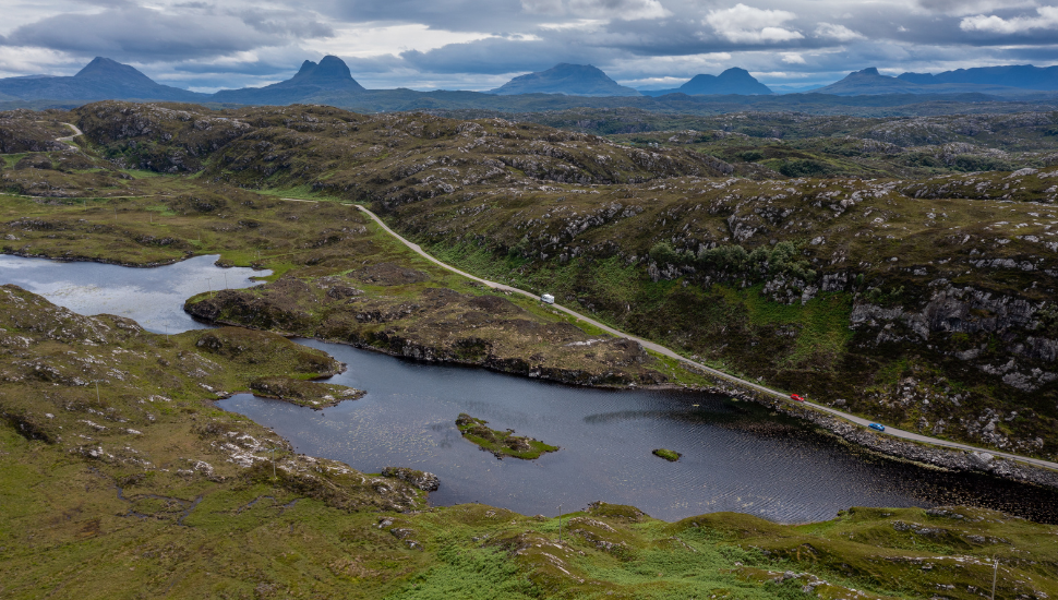 Coastal road on the North Coast 500 scenic drive in the Scottish Higlands near Lochniver
